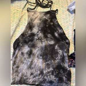 In a very  good condition and it’s open back. Color black with grey tie dye